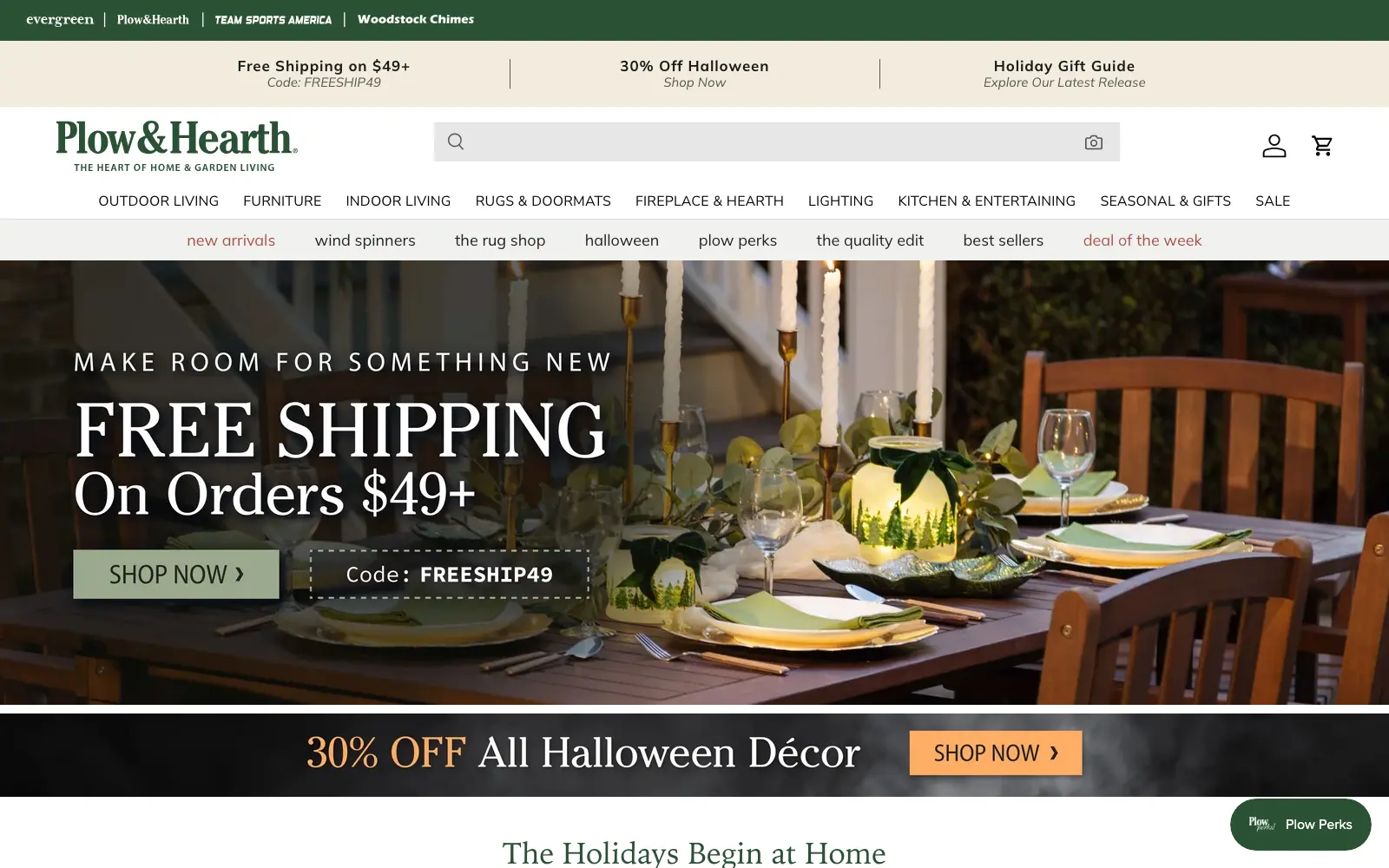 The Plow & Hearth home page, with its green and cream brand styling and promotional banners